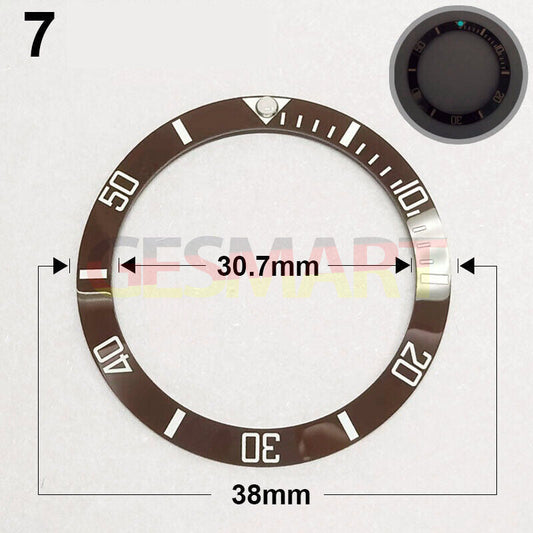 38mm ceramic brown watch bezel with silver font and green luminous details for precise timekeeping.