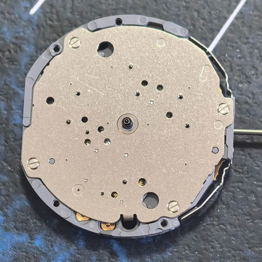 Japan Made Miyota JS10 quartz watch part with small seconds at 6, 9, and 12, perfect for precise timekeeping.
