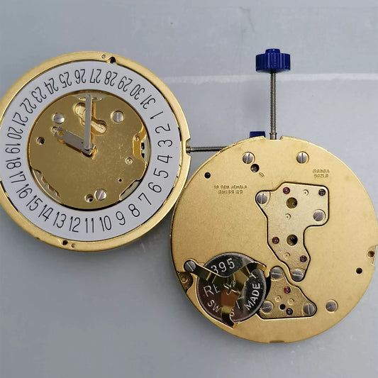Swiss Made Ronda 5021.D quartz watch movement with date at 6 on white dial