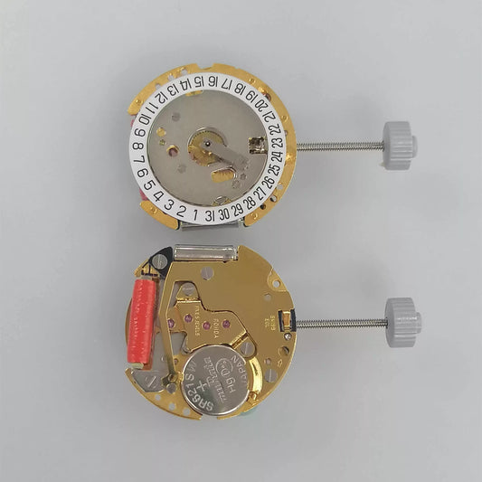 Swiss Made Ronda 775 quartz movement with white date disk at 6 o'clock, precise watch part.