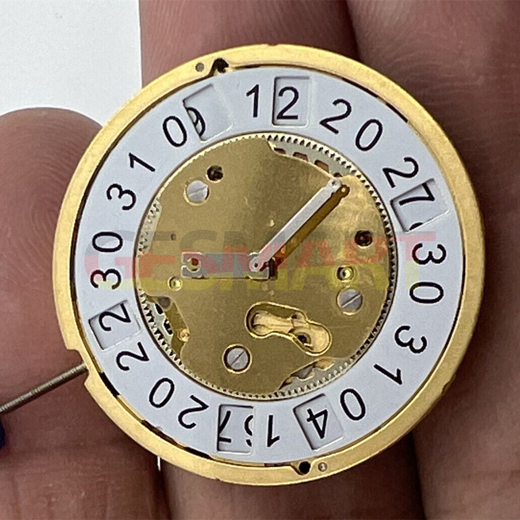 Ronda 5040B Swiss quartz watch movement with gold finish for precise timekeeping and durability.