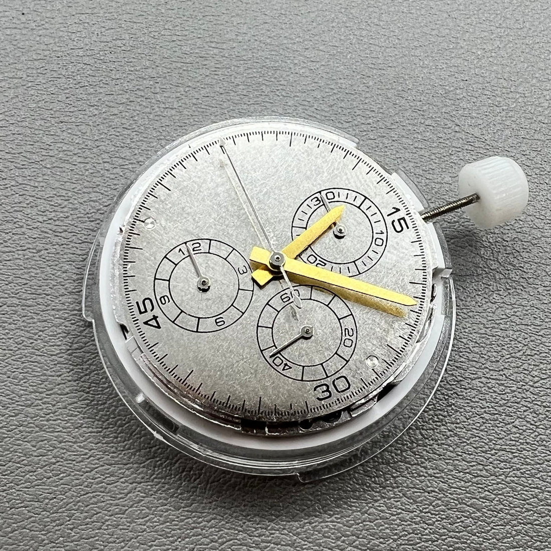 Shanghai 4131 watch with automatic mechanical movement and small seconds at 3, 6, and 9 o'clock positions.