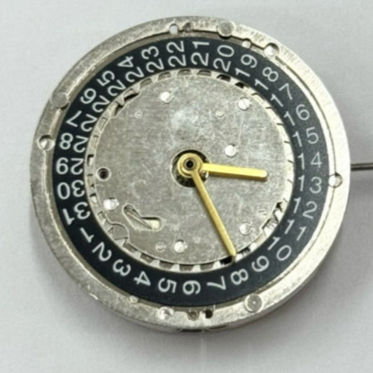 Shanghai Made silver watch movement with black disk and quick adjustment, showcasing mechanical 3 hands design.