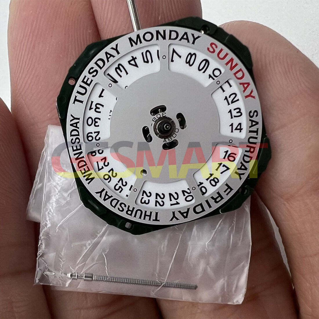 Quartz Miyota 2350 watch movement with day-date function and stem for precise timekeeping.