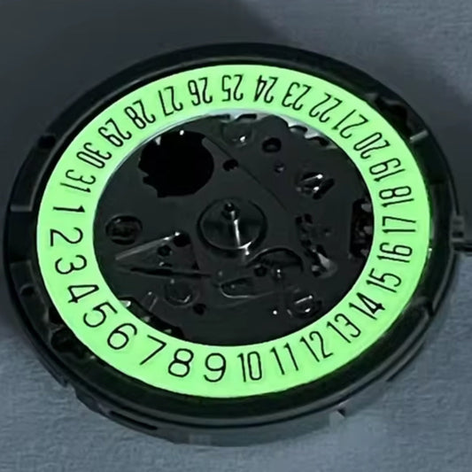 NH35 mechanical watch movement with C3 green luminous hands, date at 6, and white dial.