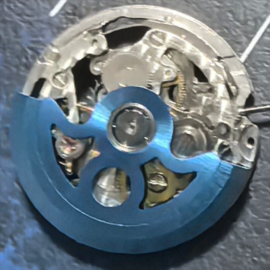 Hollow Hangzhou 2189 watch with blue rotor, automatic mechanical movement, and three-hand display by China Made