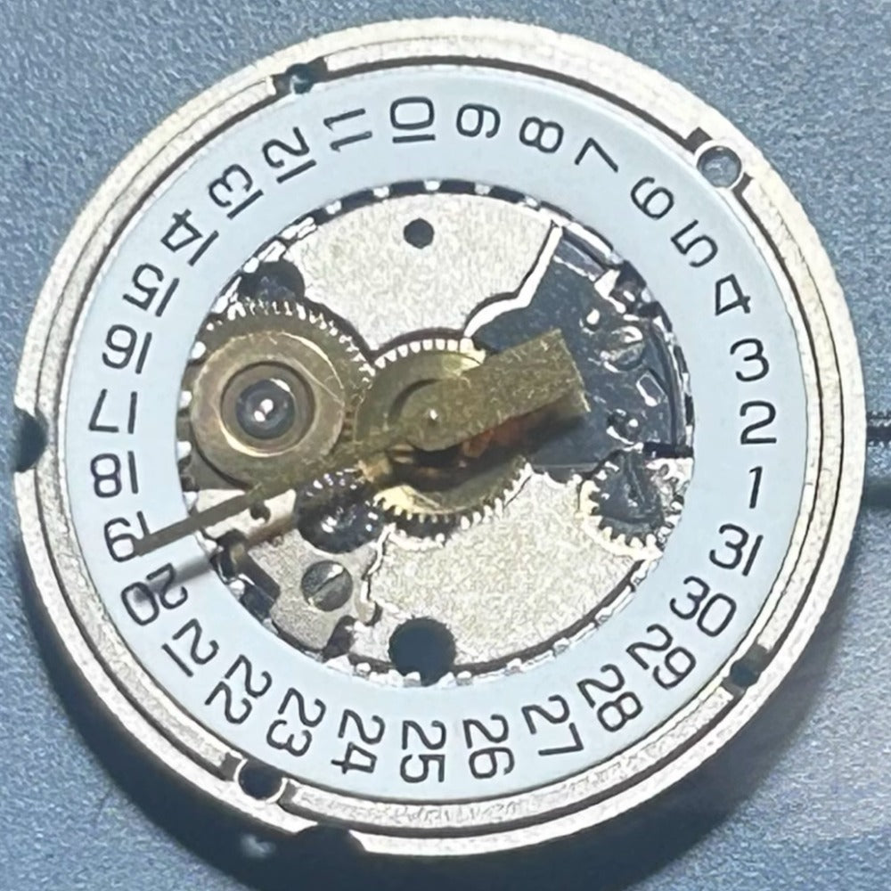 Swiss Made ETA 956.414 quartz movement with date at 3 for precise watch repair parts.