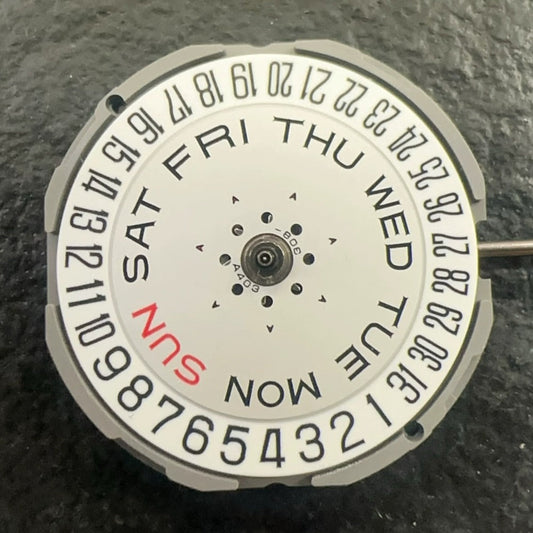 Close-up of Japan Made Miyota GM02 quartz watch movement displaying date at 6 o'clock, precision timekeeping accessory.