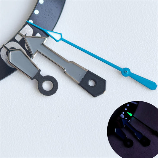 Silver-trimmed blue and green lume watch hands for NH35/36 movement, enhancing visibility and style.