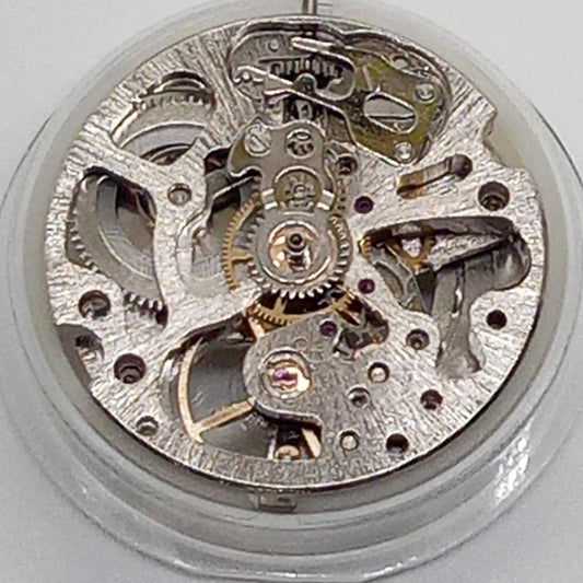 Dandong 7120 silver watch accessories showcasing mechanical movement with automatic fork detail.