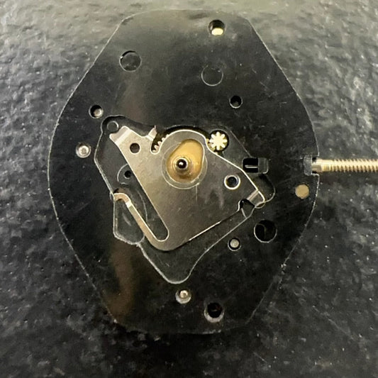 Close-up of Swiss Made ISA 638 quartz watch part with 3-hand movement, ideal for precise timekeeping.