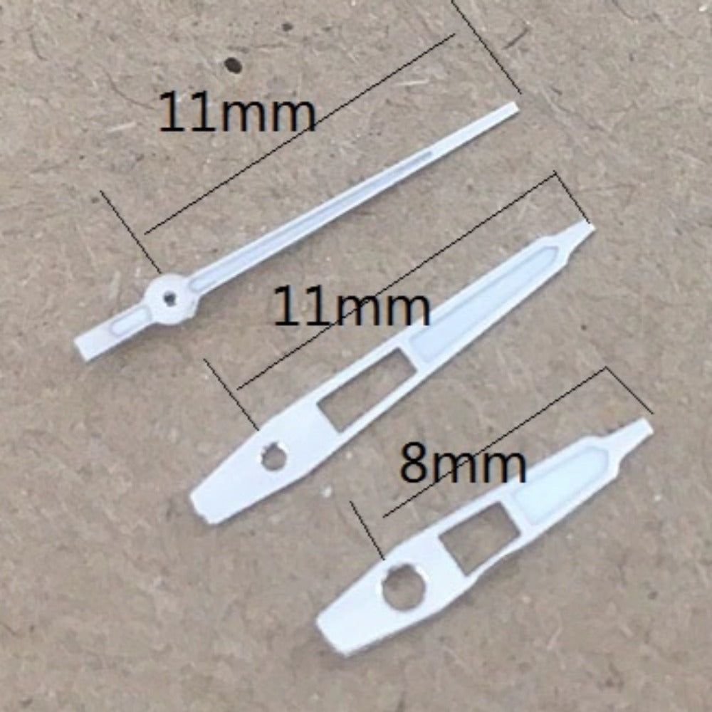 11mm silver trim green luminous watch hands for Miyota 2035 quartz movement, enhancing readability and style.