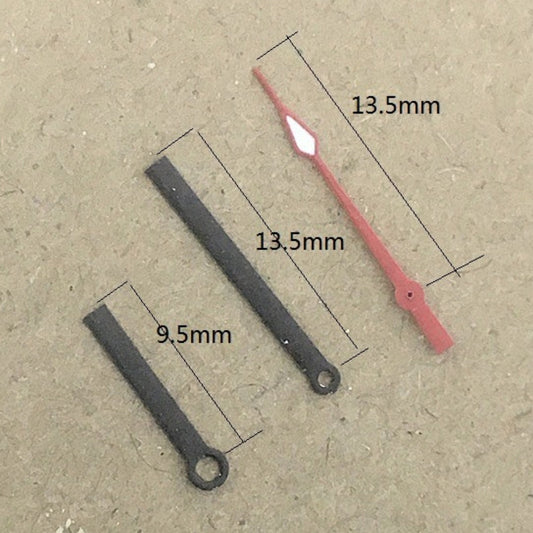 Black 13.5mm square pointed watch hands set by Ronda for 515 quartz movement, sleek design for precise timekeeping.
