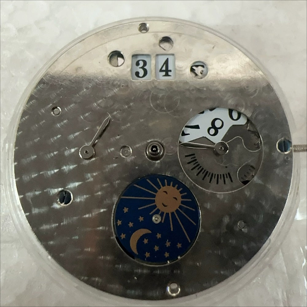 Shanghai Mechanical Movement watch with big date and small seconds at 3, 6, 9 o?clock markers, elegant design.