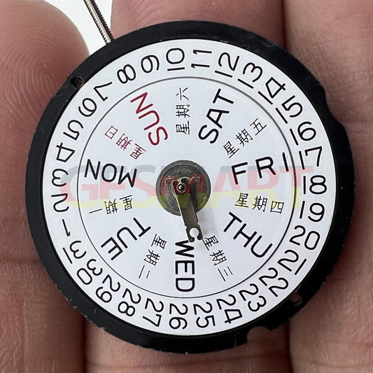 Ronda 517 quartz watch movement showing English & Chinese day and date display at 3 o'clock, Swiss parts.
