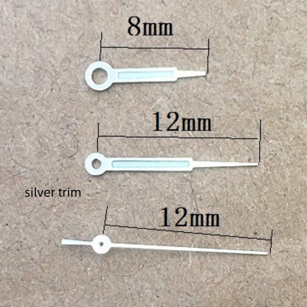 Silver trim green lume pointed watch hands set, compatible with Ronda 515 quartz movement, for precise timekeeping.