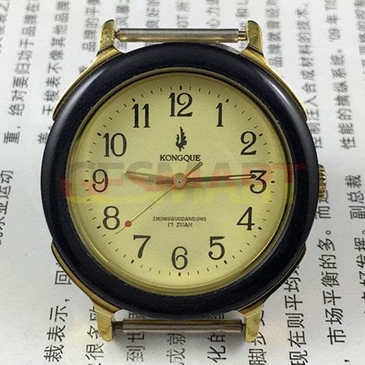 36mm China-made manual mechanical watch with 17 jewels, light yellow dial, and luminous hands for easy nighttime reading.