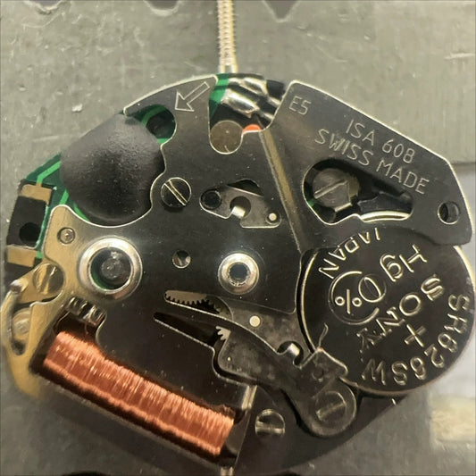Swiss Made ISA 608 quartz watch part for precise 3 hands movement, ideal for watch repairs and accessories.