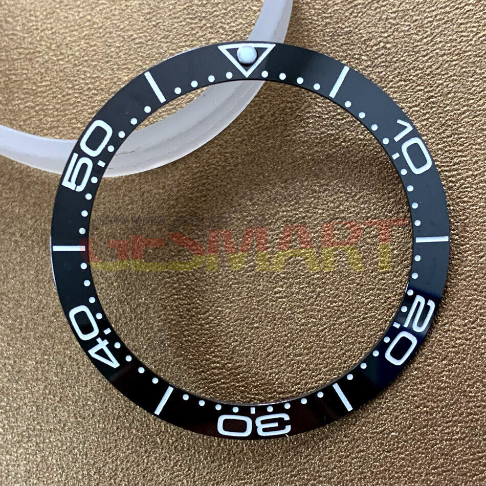 Black ceramic 38mm bezel insert with black numerals, durable watch replacement part for accurate timekeeping.