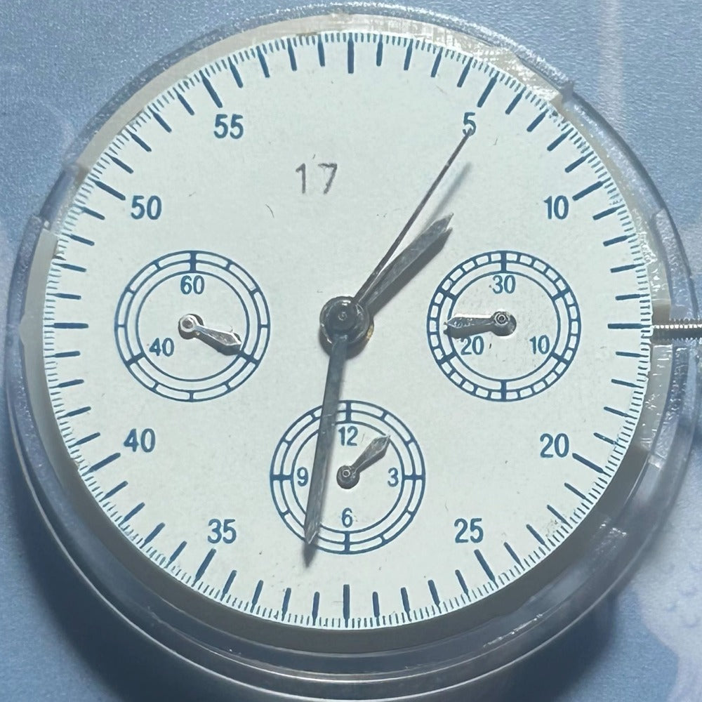 China Made Golden Dandong 7750 watch movement with small seconds at 3, 6, and 9 o?clock positions.