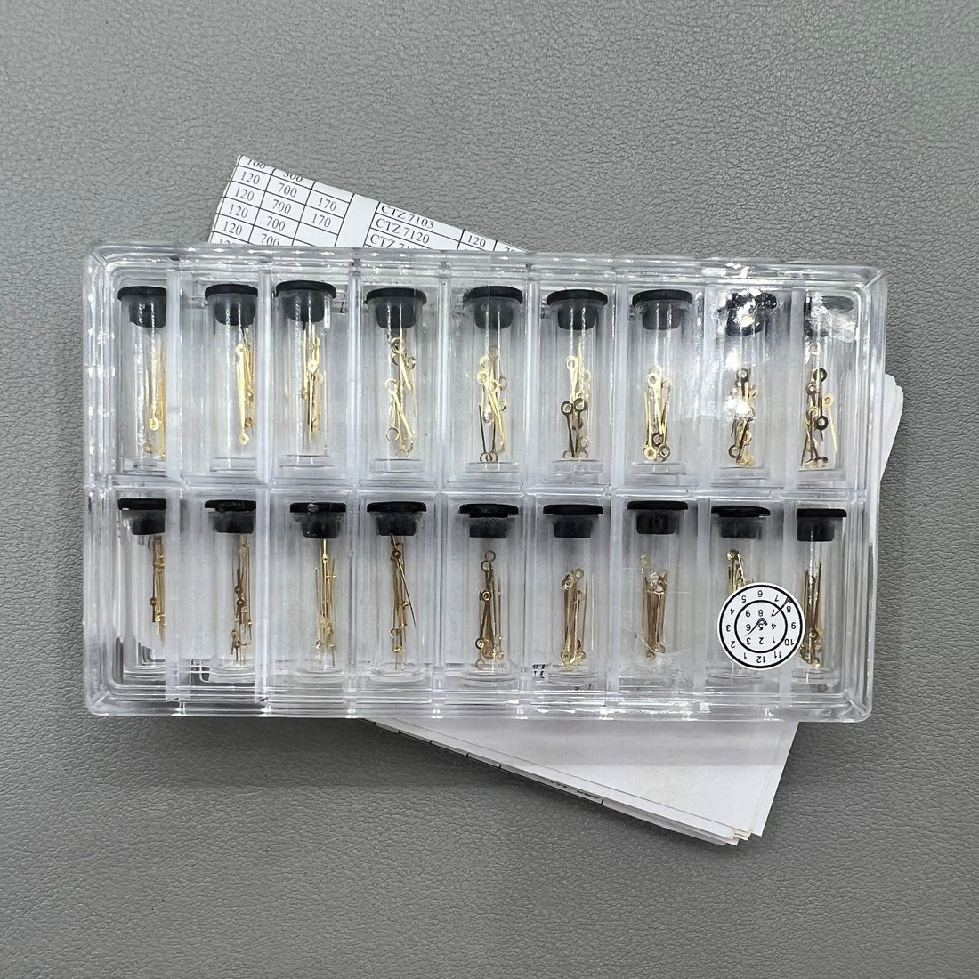 Golden watch hands set with 18 sizes including hour, minute, and second hands for precise watch repair.