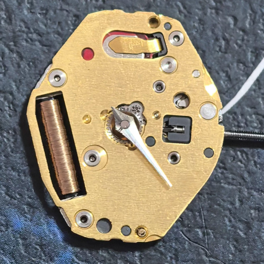 Japan-made Miyota 4T33 quartz watch movement with 3 hands, quality timekeeping part for repair or assembly.
