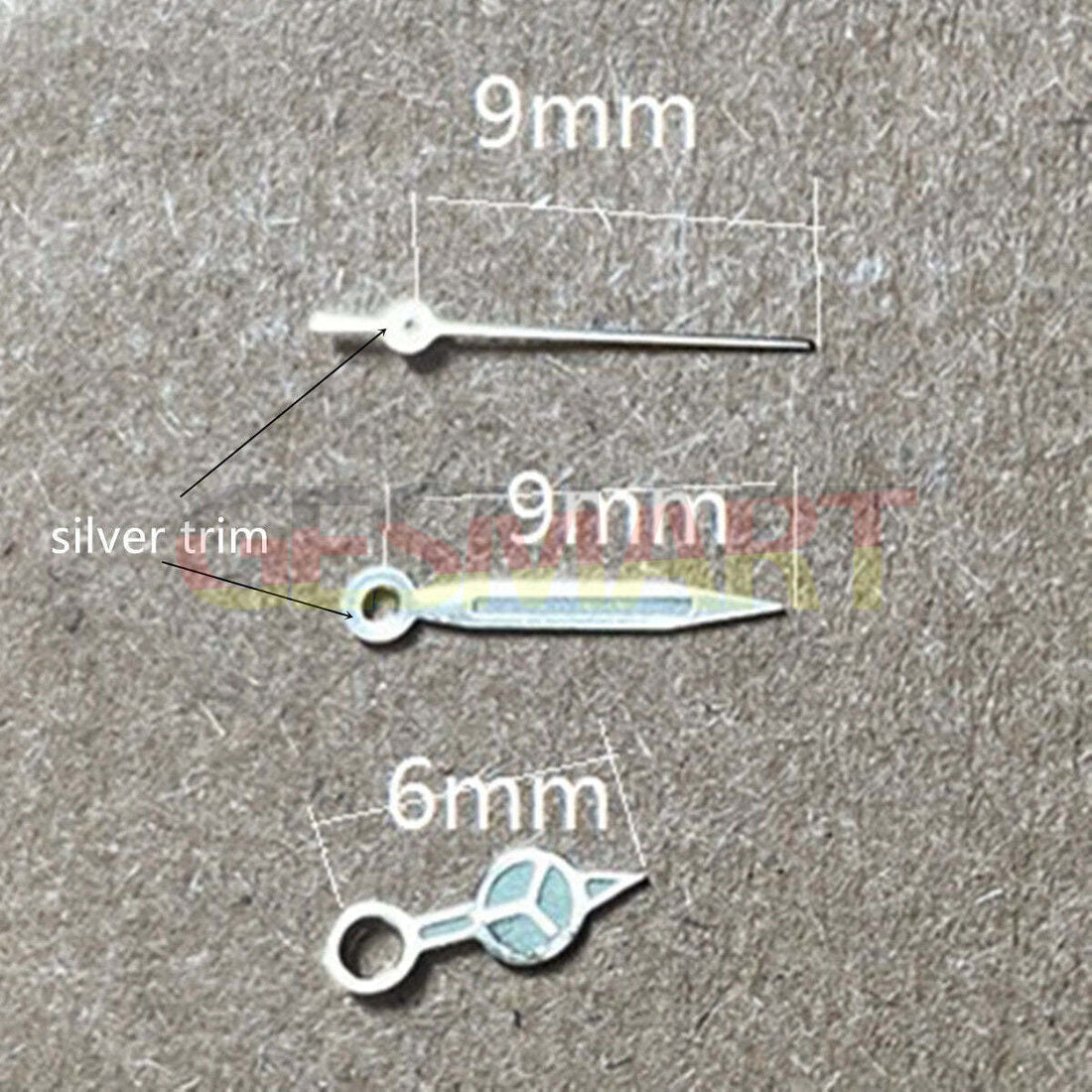 9mm green luminous watch hands with silver trim for Miyota 1M12 movement, enhancing visibility and style.