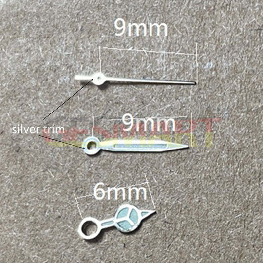 9mm green luminous watch hands with silver trim for Miyota 1M12 movement, enhancing visibility and style.