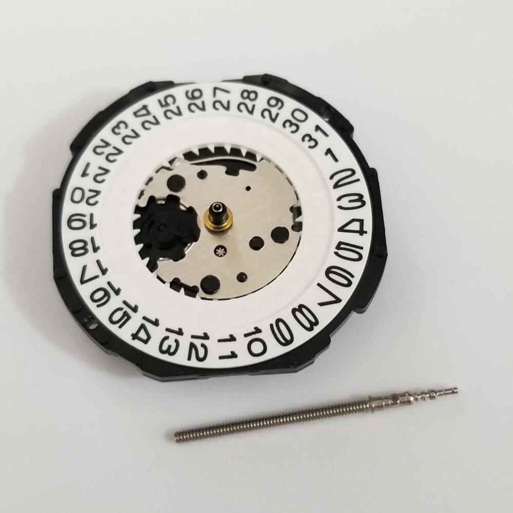 Hattori Epson TMI PC32 quartz watch movement with date display at 3 o'clock, Japan made.