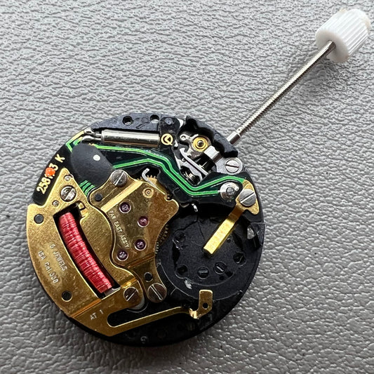 Swiss ISA 338 quartz watch movement with date at 6 o'clock and three hands, ideal for watch accessories.