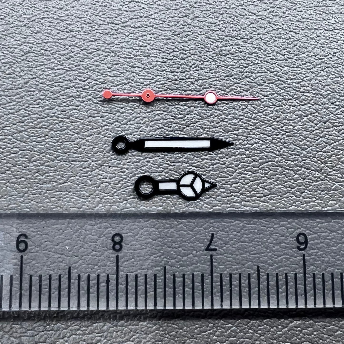 Lume black trim white orange second hand by Lume, designed for NH35/36 watch movements, precise timing detail.