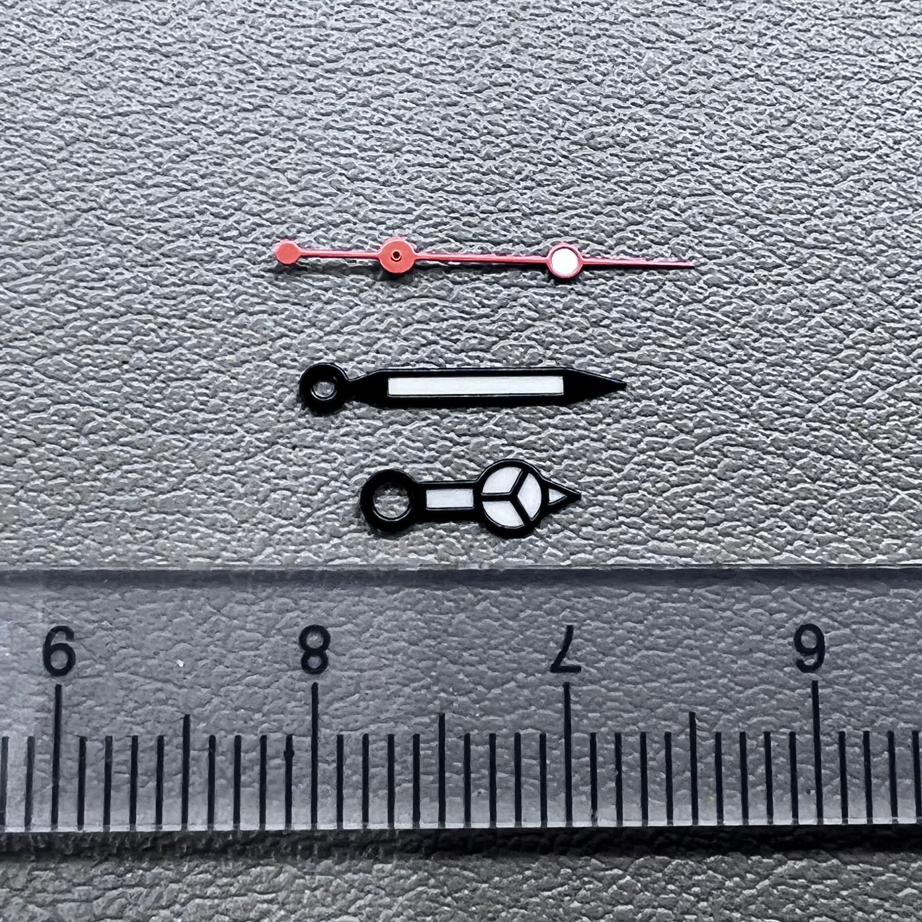Lume black trim white orange second hand by Lume, designed for NH35/36 watch movements, precise timing detail.