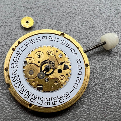 Swiss ETA255.412 quartz watch movement with 3 hands and white dial, precision craftsmanship by ETA.