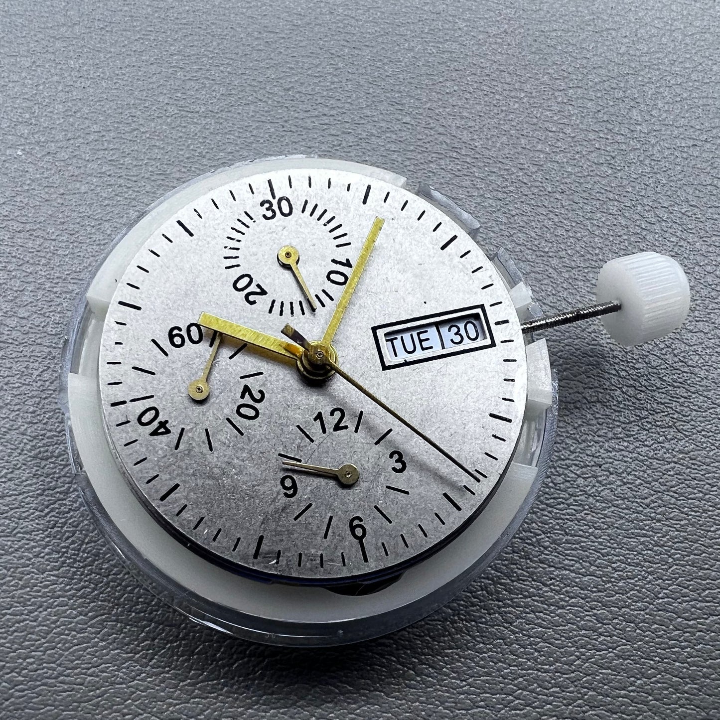 Close-up of Chinese 7750 automatic chronograph movement with day date at 3, ETA 7750 style mechanism