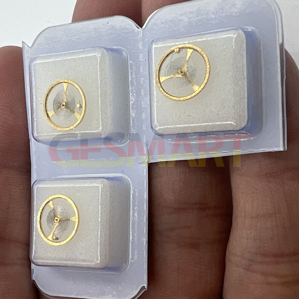 Golden balance wheel with hairspring for Orient 46941 46943 movement, ensuring precise timekeeping performance.