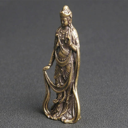 Hand-carved vintage solid copper Guanyin Buddha figurine by Thai artisan, perfect for watch accessory display.