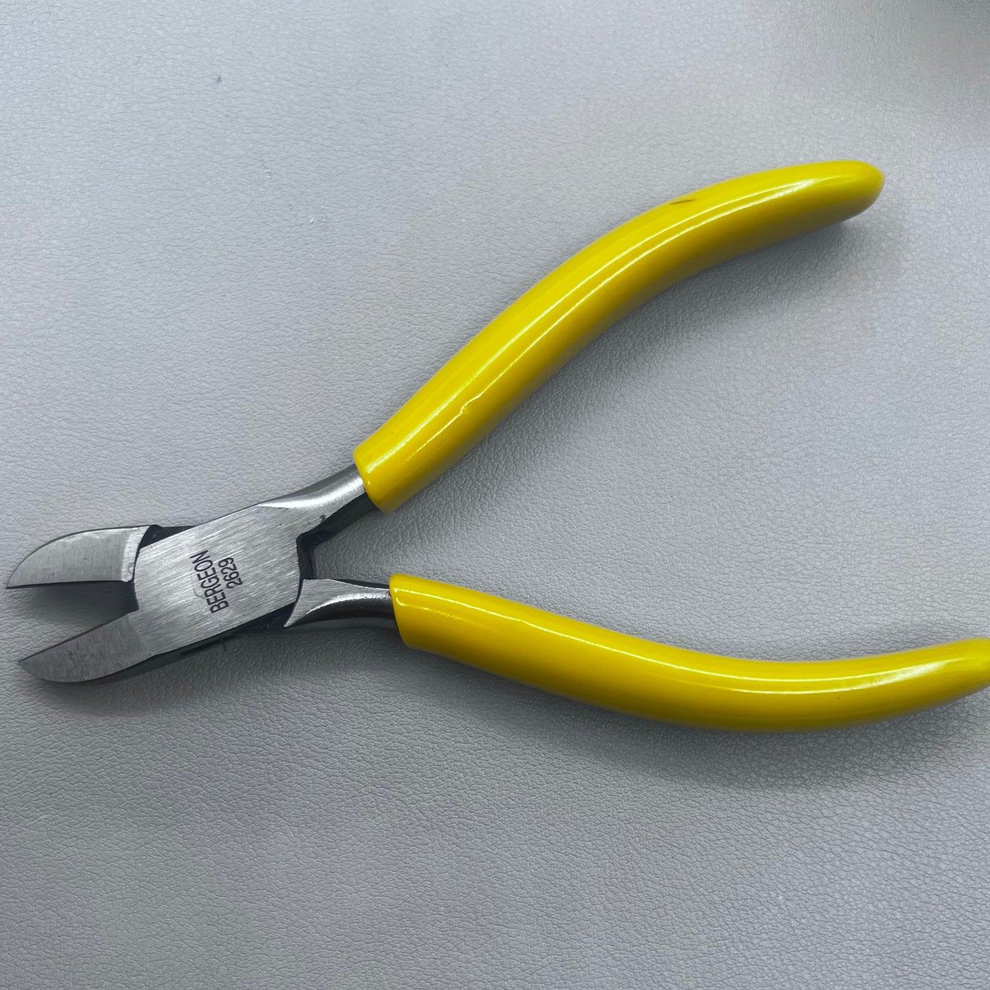 Swiss Bergeon 2629 side cutters pliers with rounded tip, 130mm precision tool for watchband adjustments.
