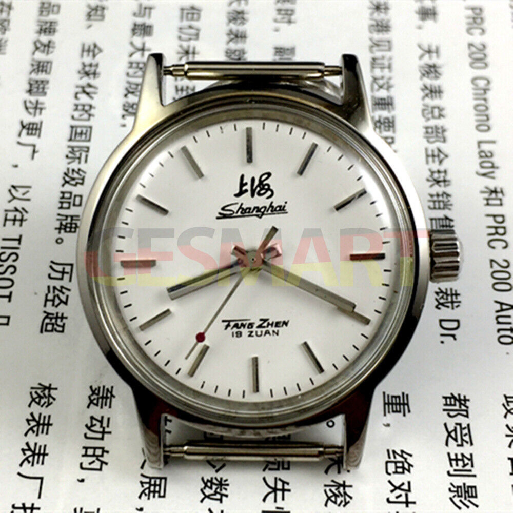 32mm Shanghai Factory manual mechanical watch with silver case and silver nail hands, classic style.