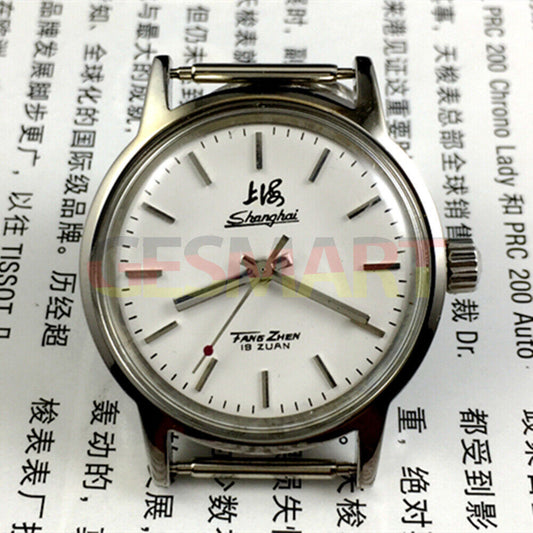 32mm Shanghai Factory manual mechanical watch with silver case and silver nail hands, classic style.