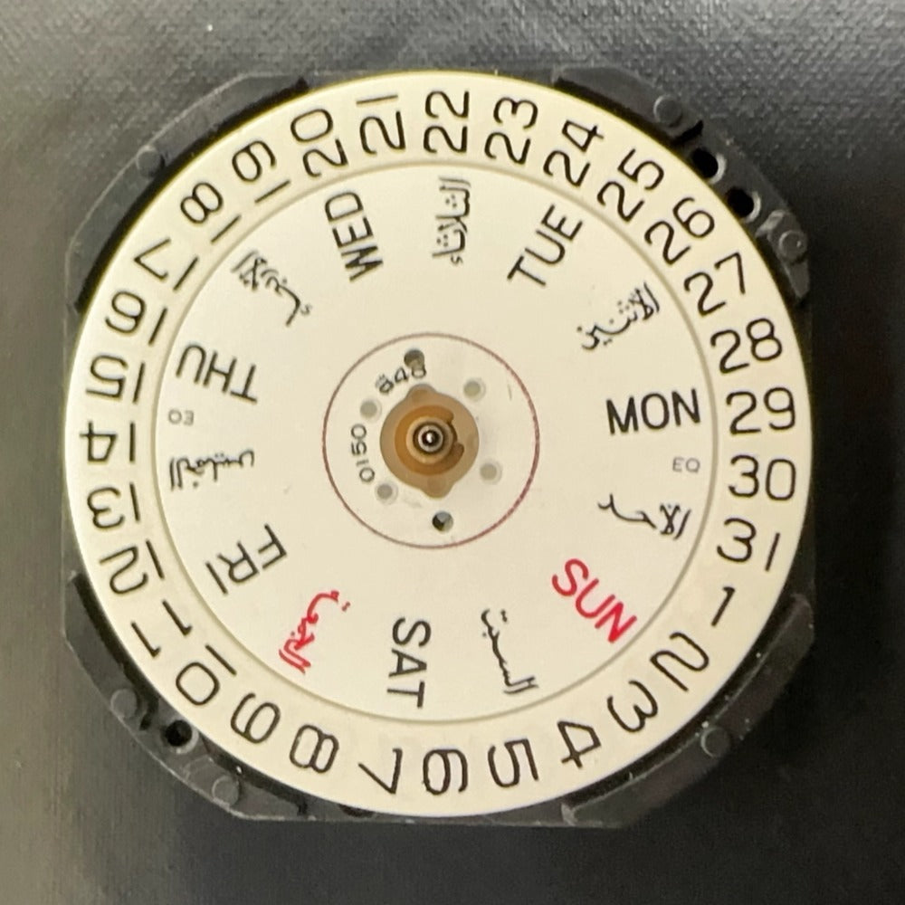 Set of 3 Epson VX33 quartz watch movements with 3 hands and bilingual Arabic-English date display at 3 o?clock.