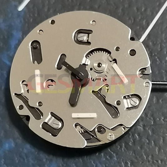 Watchmakers ISA 9238 silver quartz watch movement replacement part for repair.