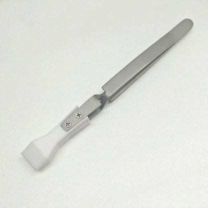 Wide headed PTFE tweezers, acid and alkali resistant, reverse self-locking for secure handling.