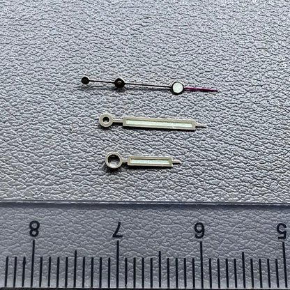 Green luminous watch hands with golden trim for NH35 NH36 movements, enhancing visibility and style.