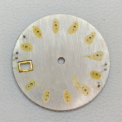 watch dial with S logo