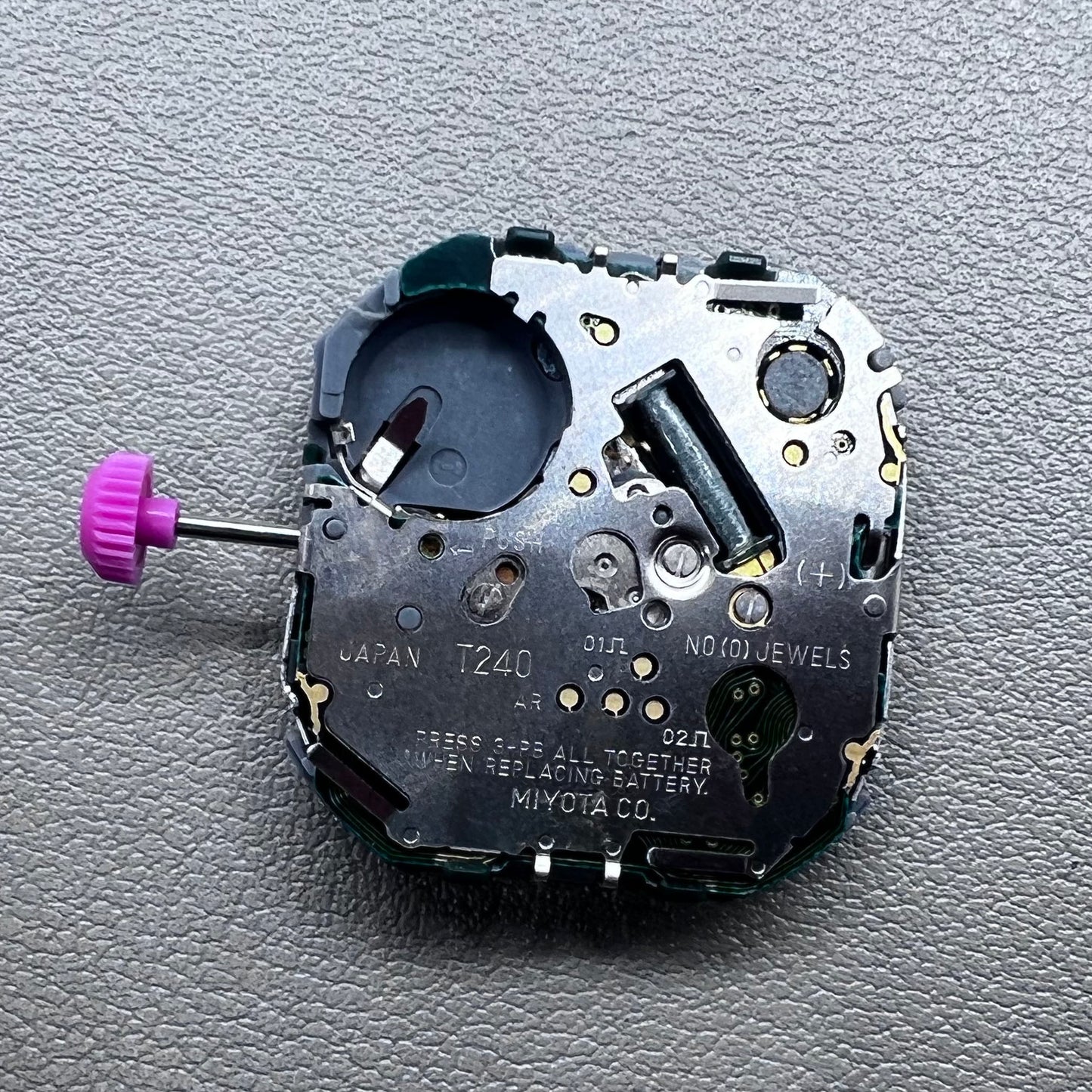 Japan T240 quartz watch movement with 3 hands and digital display, perfect for precise timekeeping accessories.