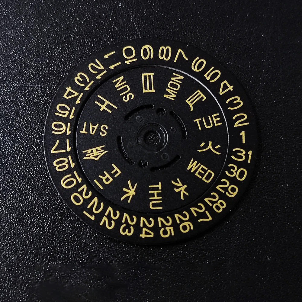NH36 watch movement with hand-held calendar date disc wheel and day match features.
