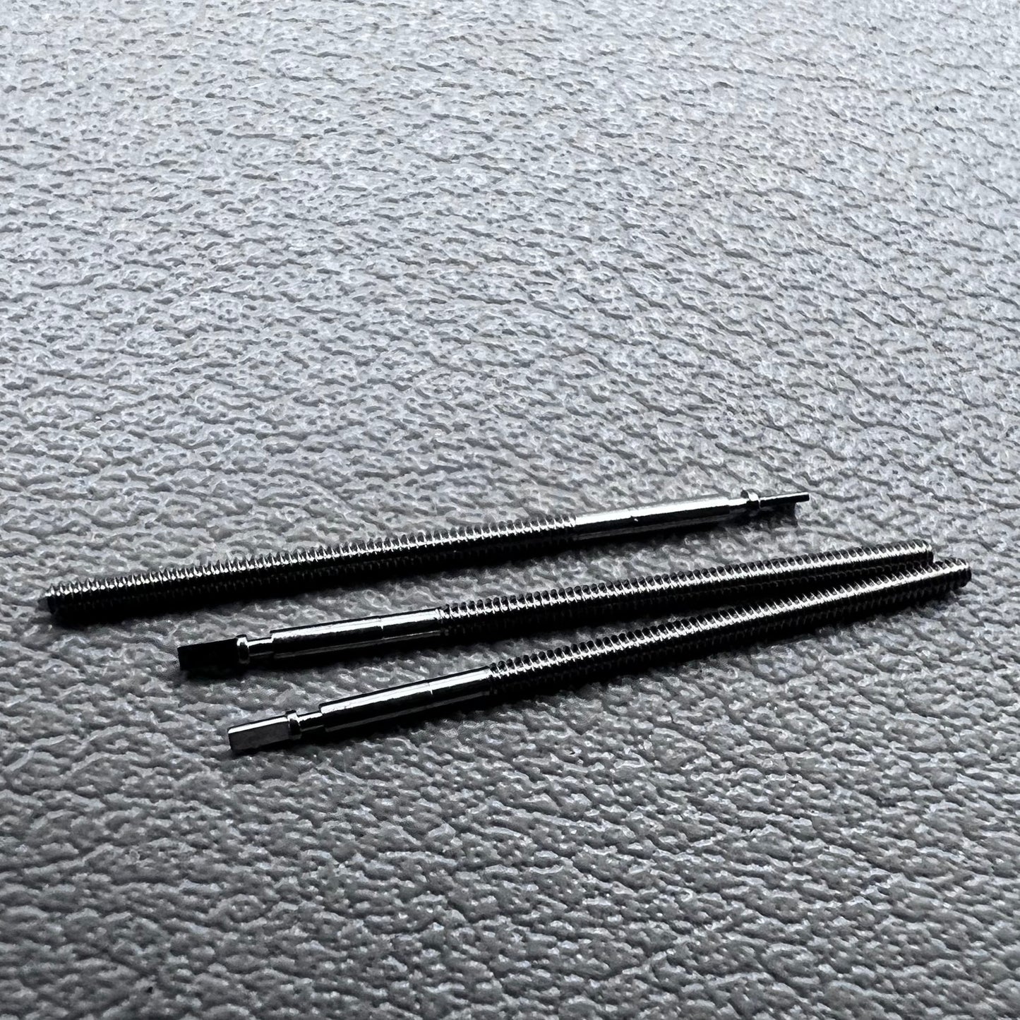 Set of 5 generic watch winding stems compatible with ETA 255.111 movement for precise repairs.