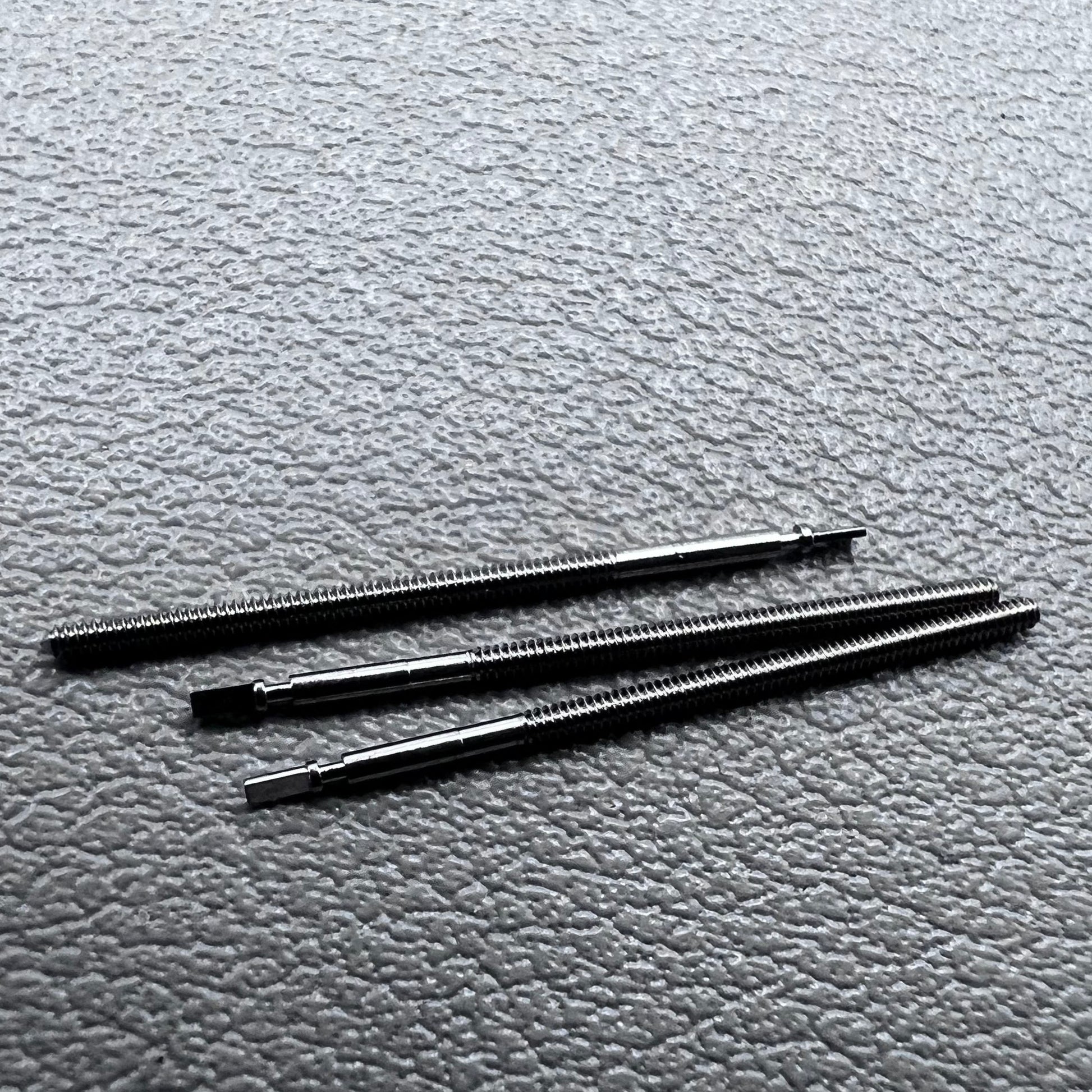 Set of 5 generic watch winding stems compatible with ETA 255.111 movement for precise repairs.