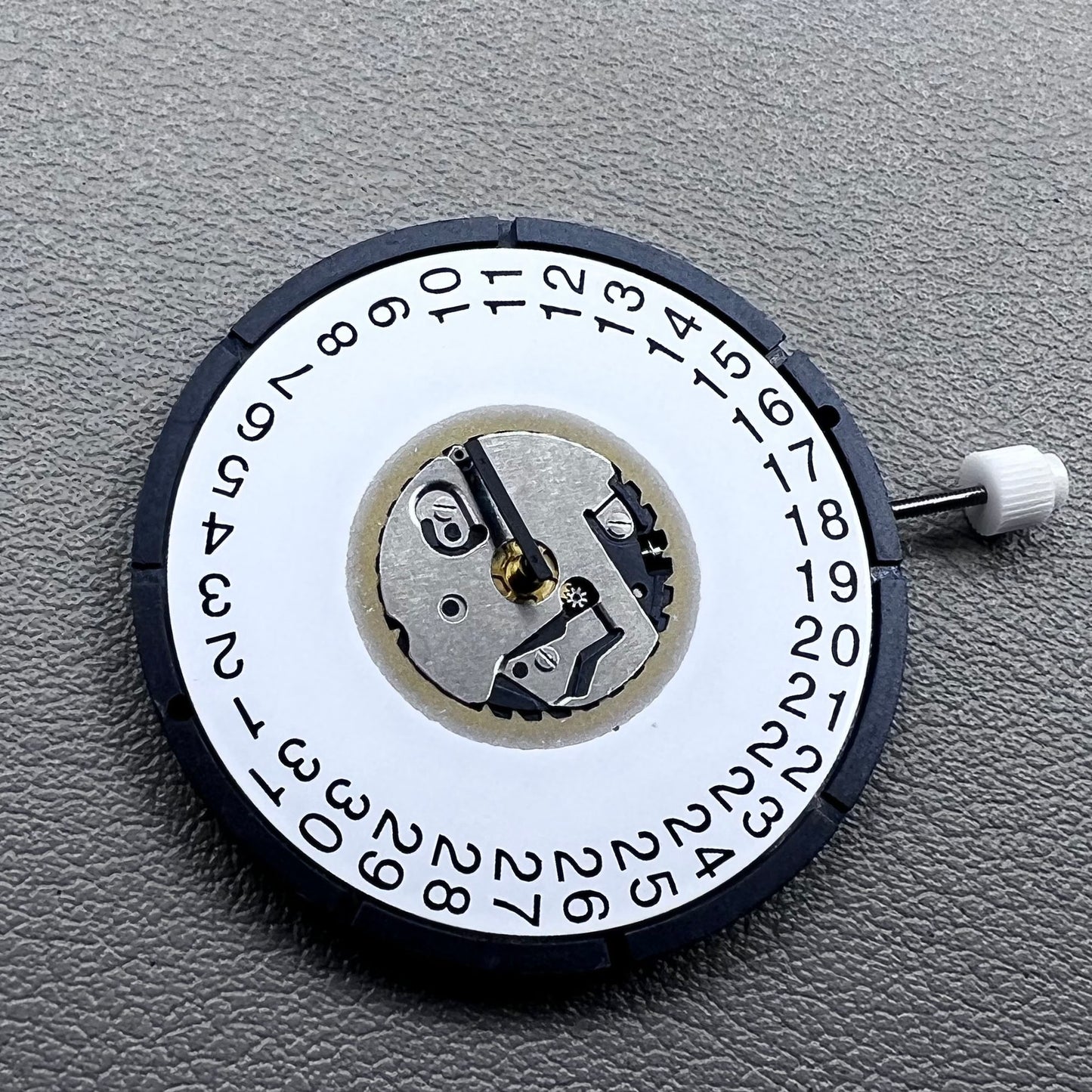 Swiss ISA 2334 quartz watch movement with date at 3 o?clock, precise timekeeping by Swiss ISA.