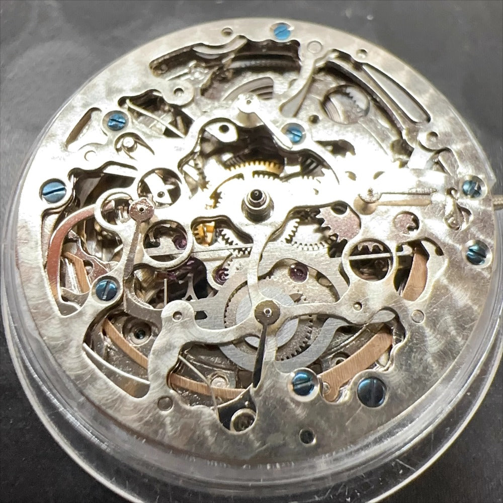 Silver hollow watch part with Hangzhou 2189 automatic movement, China-made for precise mechanical repair.